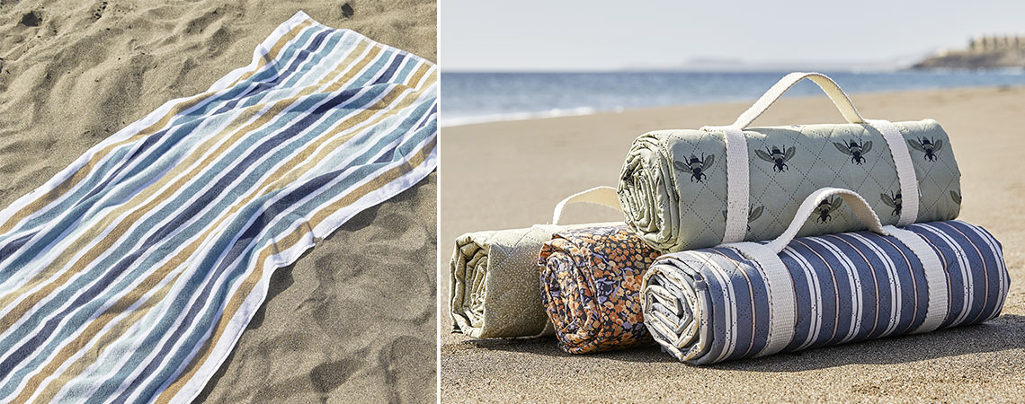 Strandhandtuch und wasserdichte Picknickdecken am Strand