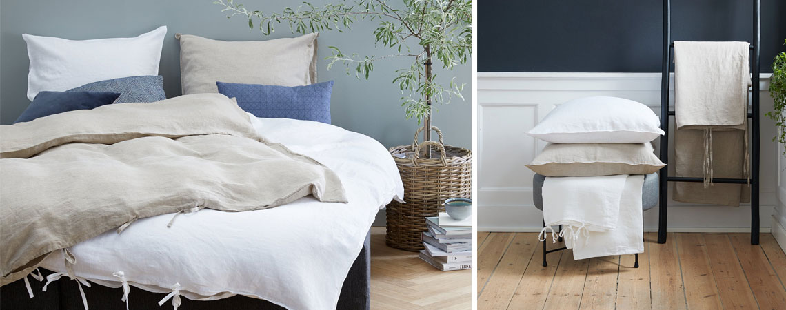 Leinenbettwäsche in Weiß und Natur auf einem Bett