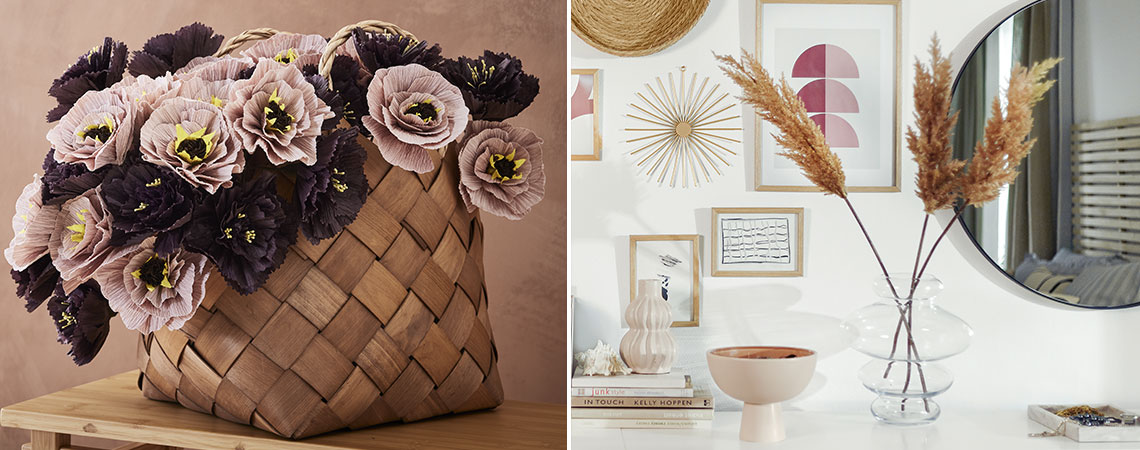 Kunstblumen in einem dekorativen Korb und einer schönen Vase
