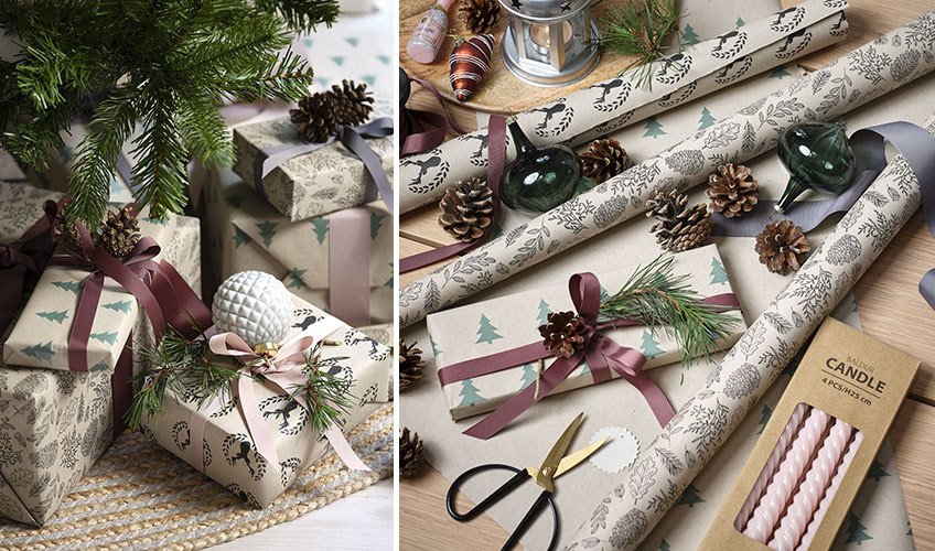 Weihnachtsgeschenke, die mit Weihnachtskugeln, Zweigen und Tannenzapfen geschmückt sind